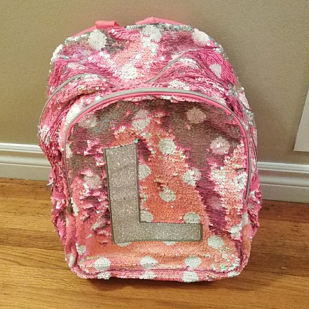 JUSTICE FLIPPY BACK PACK